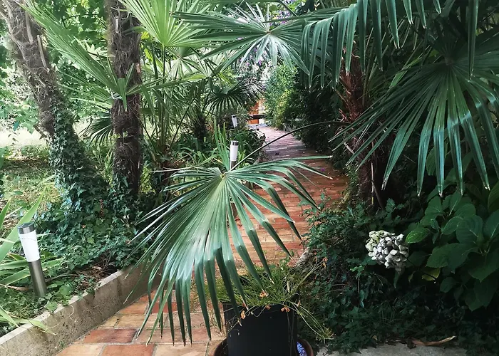 Апартаменты Secret Garden With Private Parking Space